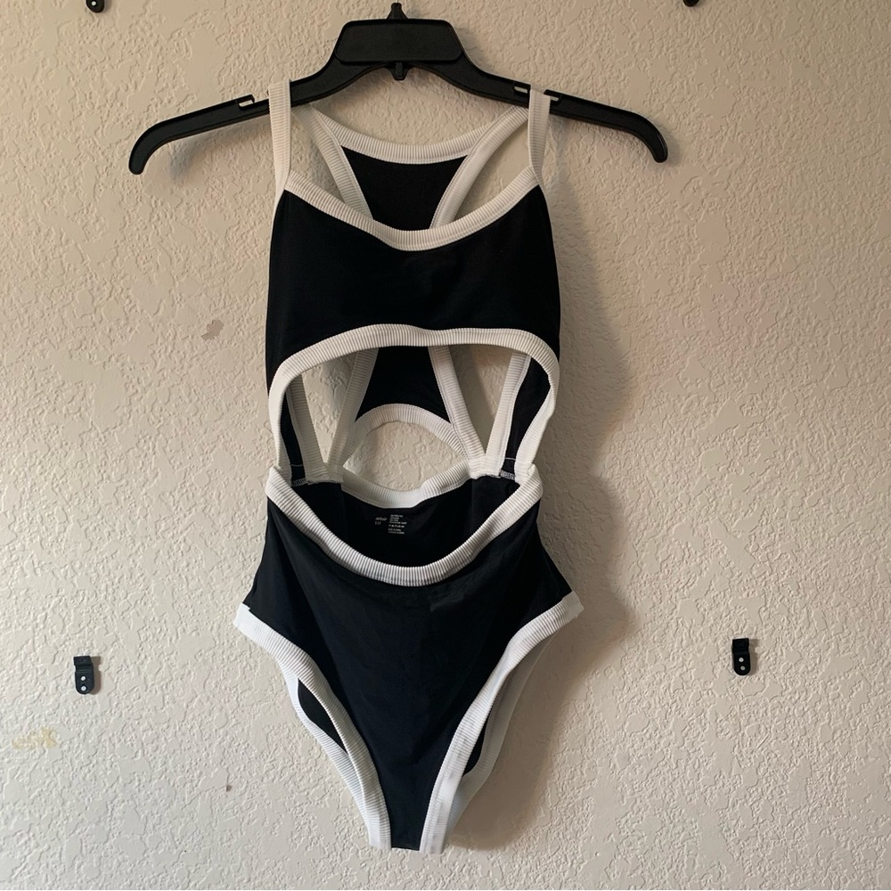 Aerie one piece black bathing suit with white ribbed trimming and cutouts
